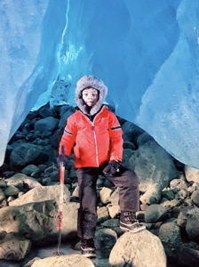 Boy Inside Ice Cave